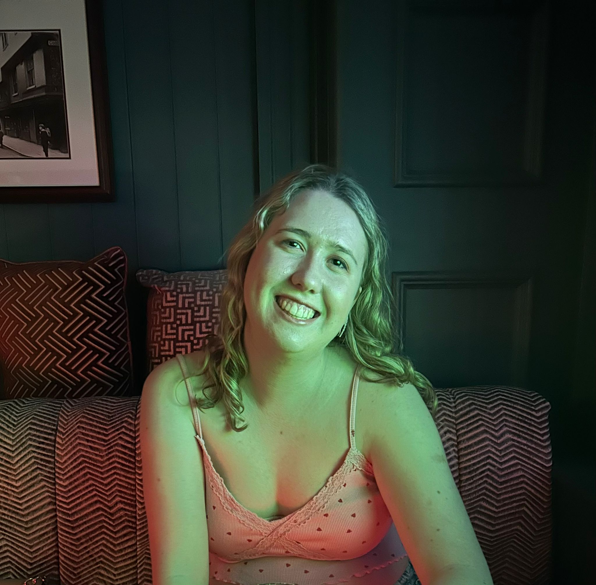 Photo of a white woman with blonde hair smiling
