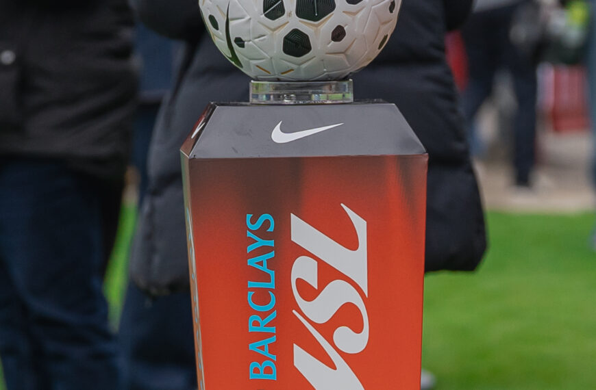 A white football on an orange WSL stand