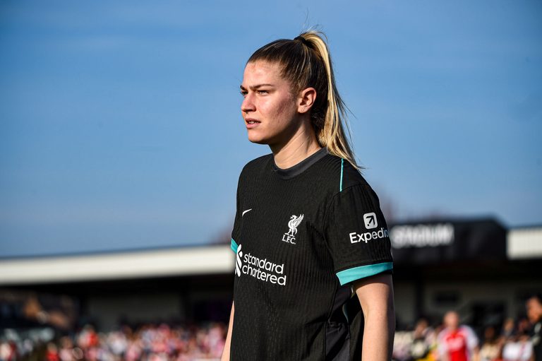Liverpool Women midfielder Marie Höbinger wearing the club’s black away kit during a match.