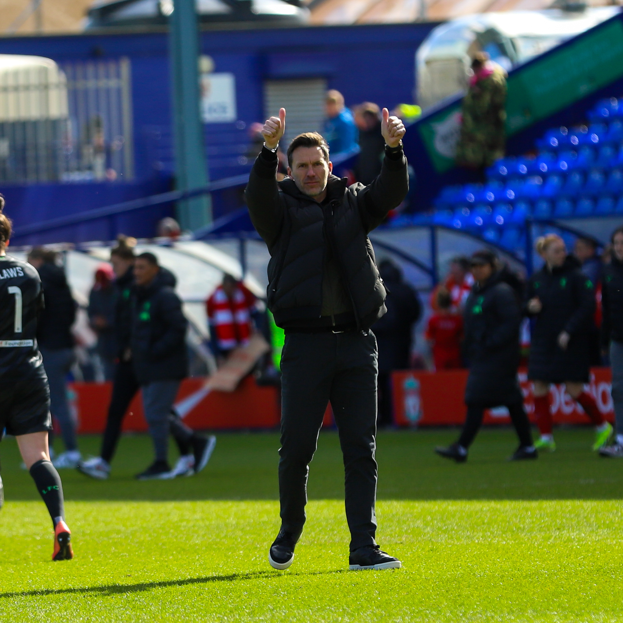 Gareth Taylor gives two thumbs up from the touchline during a match.