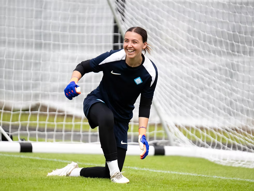 Sophia Poor - London City Lionesses Goalkeeper training whilst smiling